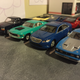 A GL Taurus SHO and a JL/Ertl F-150 SVT make a guest appearance as modern fun cars.